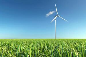 Wind turbine on grassy field against blue sky photo