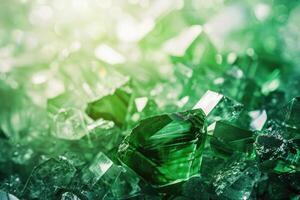 Green gemstones in natural setting with copy space on white background. photo