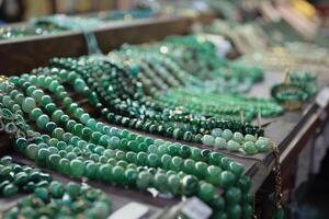 jade Jade jewelery at the Yaumatei jade market Hong Kong photo