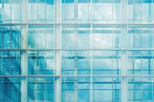 The glass window of building with white aluminum framework Blue tone as background. photo