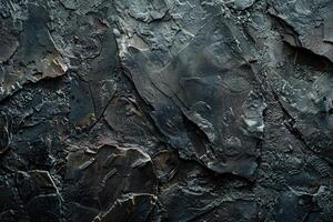 Dark stone or slate wall.Grunge background. photo