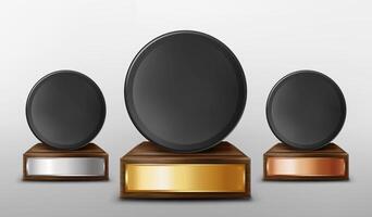 Realistic 3d illustration of trophy cups. Black pucks on wooden stand with gold, silver, bronze empty plates, isolated on white background. Award prize for victory in ice hockey competition, vector