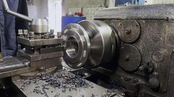 Industrial lathe crafting a flange with meticulous detail and efficiency video