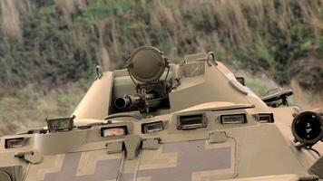 close up of armored personnel carrier and machine gun barrel. The beginning of hostilities. video