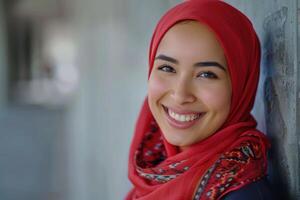 Smiling Islamic woman poses in studio showcasing Arab beauty. photo