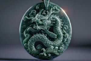 Green jade pendant in the shape of a dragon jade photo