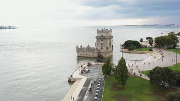 Aerial drone shot of Belem Tower overlooking cityscape. video