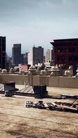 A city skyline with towering buildings and a prominent roof in the foreground video