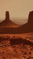 A stunning aerial view of a majestic rock formation in the heart of the desert video