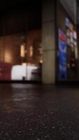 A store front at night, captured in a blurry and mysterious way video