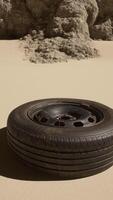 A tire sitting in the middle of a desert video