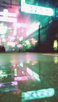 A city street at night with neon lights video