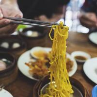 Steamed dim sum packed in bamboo containers photo