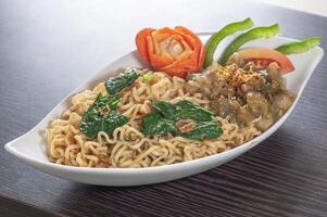 Mie Instant Kikil or Instant Noodle served with Beef knuckle photo