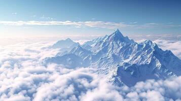 Majestic snowy mountain peak above the clouds photo