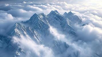 Majestic snowy mountain peak above the clouds photo