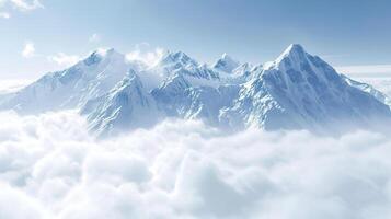 Majestic snowy mountain peak above the clouds photo