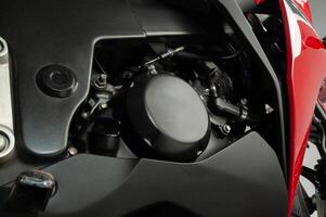 detail view of red sports type motorbike with fuel injection system, 250 cc engine, photo