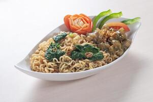 Mie Instant Kikil or Instant Noodle served with Beef knuckle photo