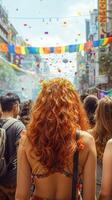 Back view of people with LGBT and flags parade on the street, festive happy day, photo