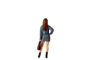 Miniature Business Woman holding suitcase standing isolated on white background with clipping path photo