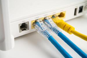 Ethernet cable with wireless router connect to internet service provider internet network. photo