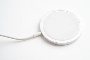 Wireless charger, magnetic charging modern equipment of mobile phone. photo