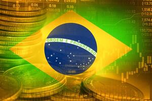 Stock market investment trading financial, coin and Brazil flag , finance business trend data background. photo