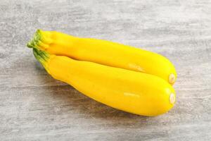 Yellow young zucchini for cooking photo