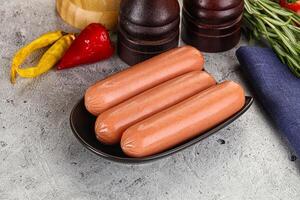 Boiled sausages for breakfast photo