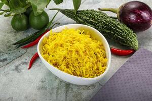 Indian cuisine - Lemon rice with spices photo