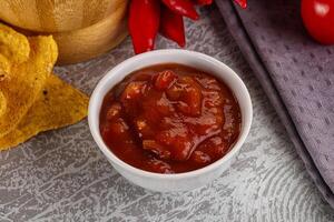 Spicy mexican sauce Salsa dip photo