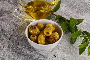 Grilled green olives appetizer snack photo