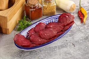 Smoked beef meat - Pastrami slices photo