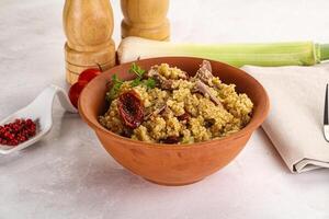 Bulgur with lamb and vegetables photo