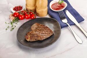 Grilled marble beef steak with sauce photo