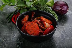 Indian cuisine - chicken tikka barbecue photo