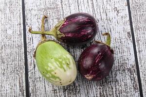 Heap of raw asian baby eggplant photo