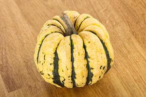 Ripe raw fresh decorative pumpkin photo