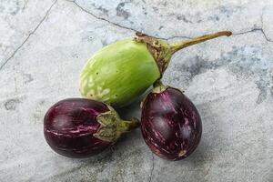 Heap of raw asian baby eggplant photo