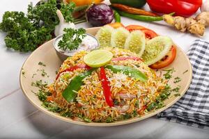 Indian chicken biryani rice with chicken photo