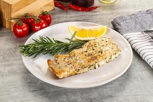 Baked salmon fish served rosemary photo