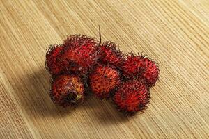 Sweet ripe juicy hairy Rambutan photo