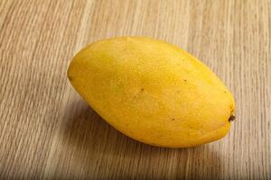 Sweet ripe juicy tropical mango fruit photo