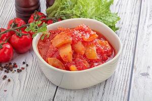 Hungarian lecho with tomato and paprika photo