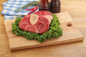 Raw ossobuco beef meat for cooking photo