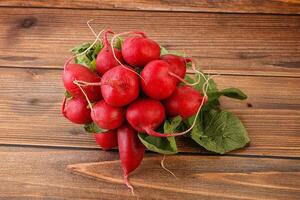 Heap ripe fresh red radish photo