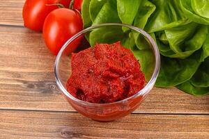 Tomato puree sauce for cooking photo