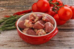 Raw chicken hearts for cooking photo