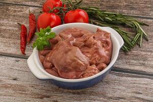 Raw chicken liver in the bowl photo